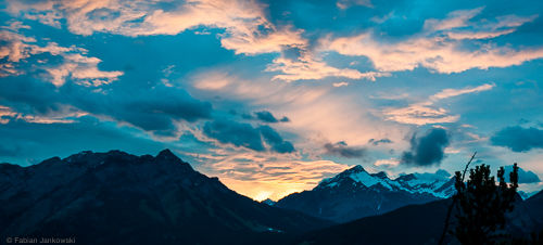 The skyline of the Canadian Rocky Mountains at sunset seen from Banff national park.