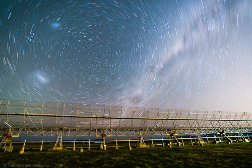 The Molonglo radio telescope in front of the Milky Way and the South Celestial pole.