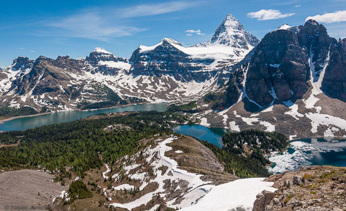 View of the Assiniboine Valley. From left to right: Lake Magog, Mt. Assiniboine, Sunburst Lake, Sunburst Peak and Cerulean Lake.