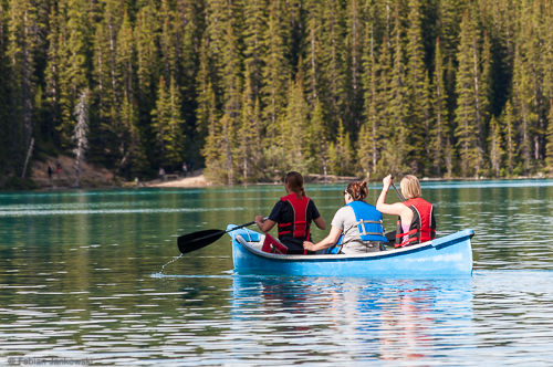 People kayaking on Moraine Lake.